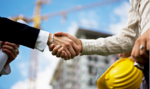 Shaking Hands Construction 300x178 - Mind Those Hidden Costs in Dental Office Construction